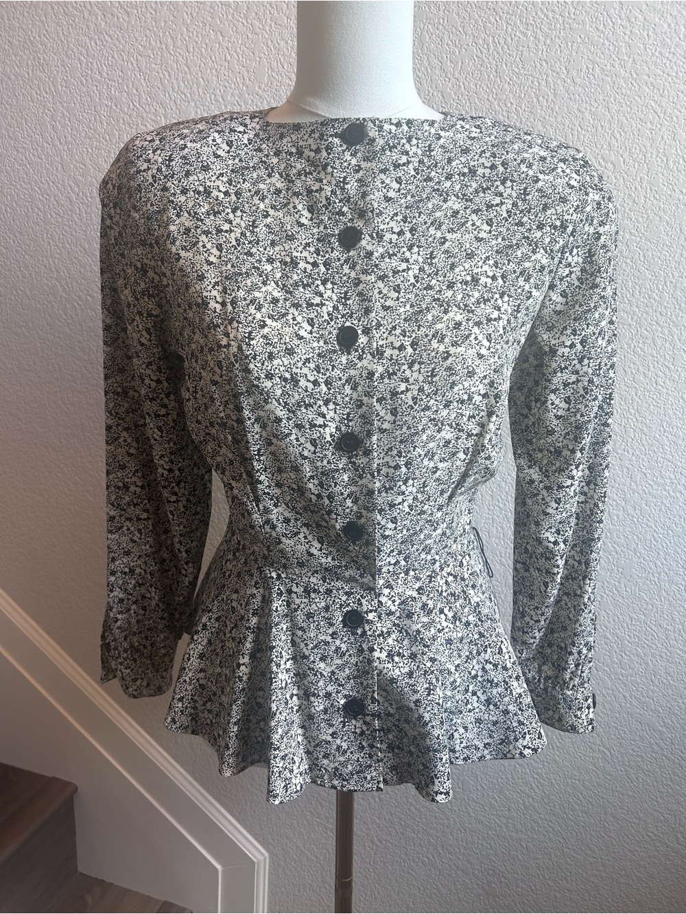Silk Black and White Patterned Button-Front Peplum Blouse with Long Sleeves